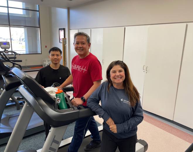 People walking on treadmill during training
